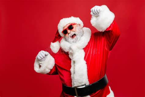 Portrait Of Crazy Funny Modern Santa Claus Raise Fists Scream Yeas