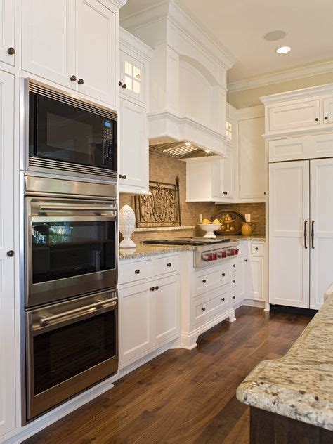 Double Oven With Microwave Along Side With Range Top And Understated