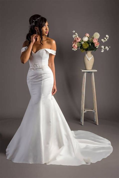 Sleek And Sweet This Timeless Trumpet Style Wedding Gown Features A