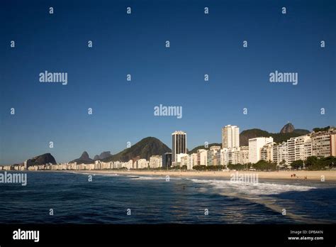 Copacabana Beach And Buildings With View Of Christ The Redeemer