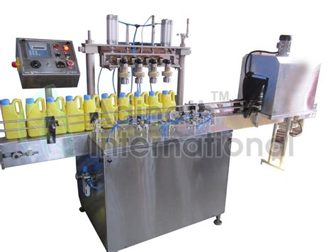 Adinath Automatic Multihead Screw Capping Machine AMSCM Manufacturer Seller In Ahmadabad