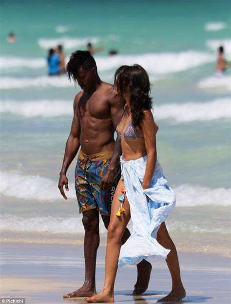 Shanina Shaik and shirtless fiancé DJ Ruckus share kiss on Miami Beach