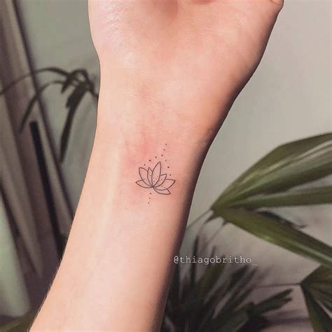Minimalist Lotus Flower Tattoo On The Wrist