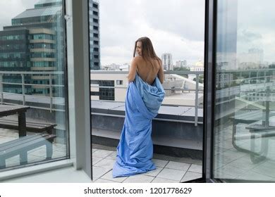 Naked Girl Wrapped Blanket Stands On Stock Photo 1201778620 Shutterstock