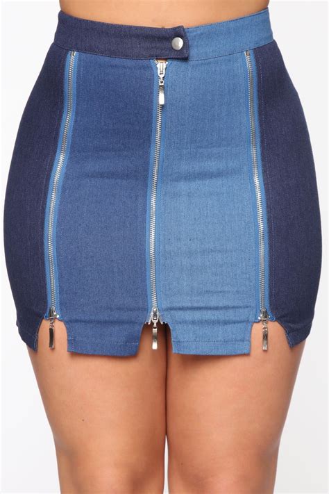 available in dark denim mixed denim mini skirt functional zipper detail solid back button and