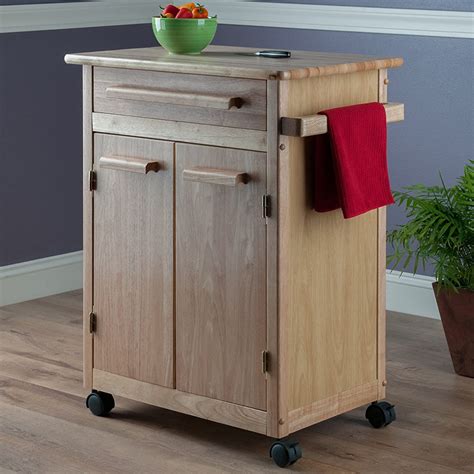 A kitchen cart is a gift for the busy cook who needs more work space and storage in the kitchen. Winsome Wood Single Drawer Kitchen Cabinet Storage Cart ...