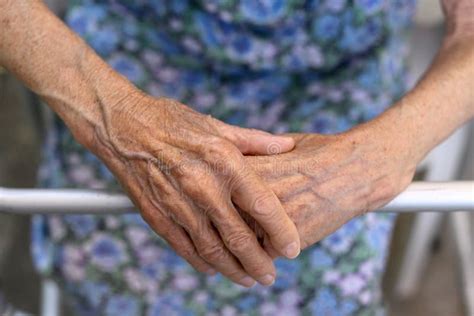 Old Lady Arm Hand Of Elderly Women On A White Background Stock Photo
