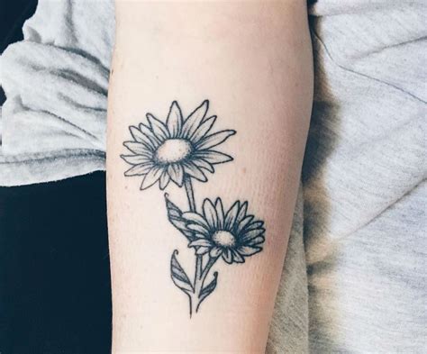 24 Photos Of Cheerful Daisy Tattoos