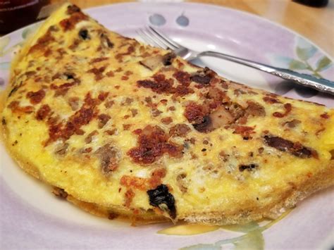 Homemade 3 Egg Omelette With Sausage Portabella And Cheese
