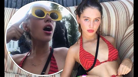 Iris Law Stuns In A Skimpy Red Halterneck Bikini As She Posts Cheeky