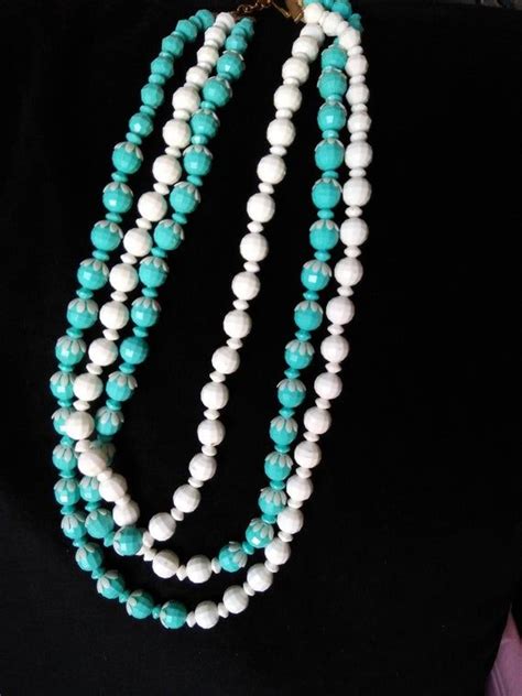 This Is A Beautiful Necklace With White And Turquoise Plastic Beads