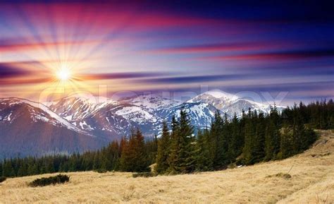 Majestic Sunset In The Mountains Stock Photo Colourbox