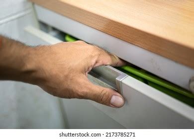 Human Hand Stuck Pinned By Cupboard Stock Photo Shutterstock