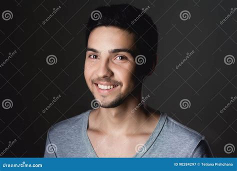 Portrait Of A Normal Boy Over Grey Background Stock Photography