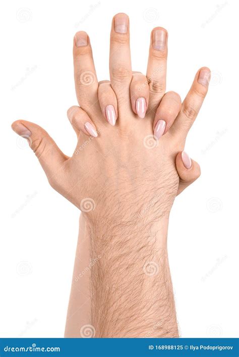 Interlocked Fingers Of Two Male Hands On Blue Background Royalty Free
