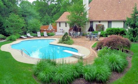 Your swimming pool will need a fence, wall, or barrier around it, so we put together this list of the best swimming pool fence ideas to help you design your dream backyard. Swimming pool in the garden - landscape ideas for swimming ...