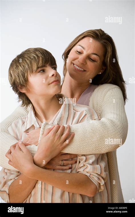 Mother Holding Son Stock Photo Alamy