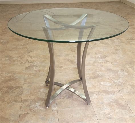The emmerson dining table has an industrial design with a butterfly mechanism located under the table's top. Neptune Table Bases - Custom Metal Home