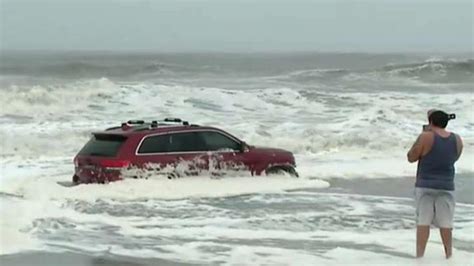 Jeep Abandoned On Myrtle Beach As Hurricane Dorian Rages Onlookers