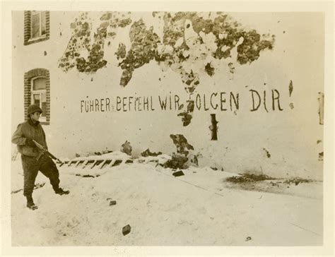 Serviceman Standing In Front Of German Graffiti The Digital