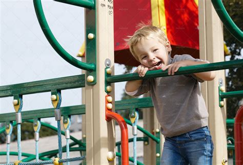 Boy On A Playground Stock Photos Motion Array