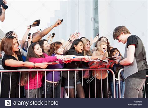 Celebrity Signing Autographs For Fans Stock Photo Alamy