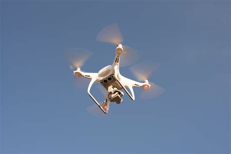Low Angle Shot Of Drone Flying In The Sky · Free Stock Photo