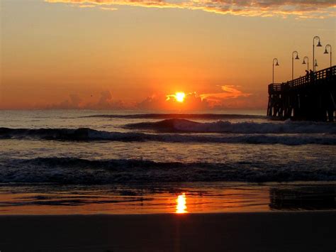Sunrise At Daytona Beach Pier 001 Photograph By Chris Mercer
