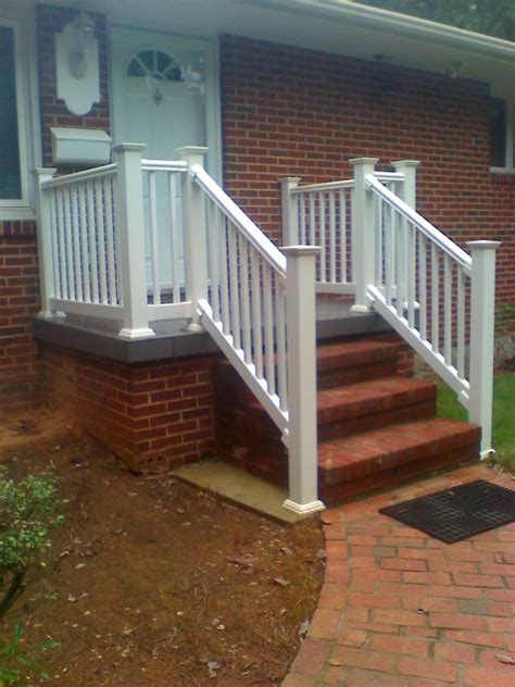 Aluminum railings are a good match for stone steps because they're strong, provide a safe grip, and often come in simple, sleek styles that . white railing on a concrete porch | Boling Front Porch ...