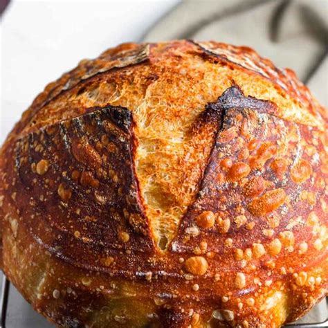 Rustic Sourdough Bread With A Perfect Crust And Open Crumb The Flavor Bells