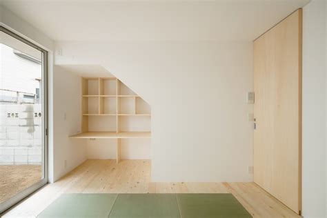 Minimalist Japanese Residence Enhancing A Narrow Site