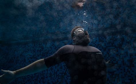 Underwater Men Drowning Underwater In Tight Wetsuit