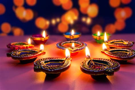 Indian Festival Diwali Diya Oil Lamps Lit On Colorful Rangoli Hindu Traditional Happy