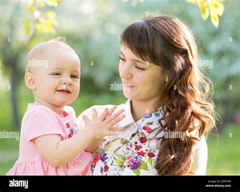 Happy Mother With Baby Outdoors Stock Photo Alamy