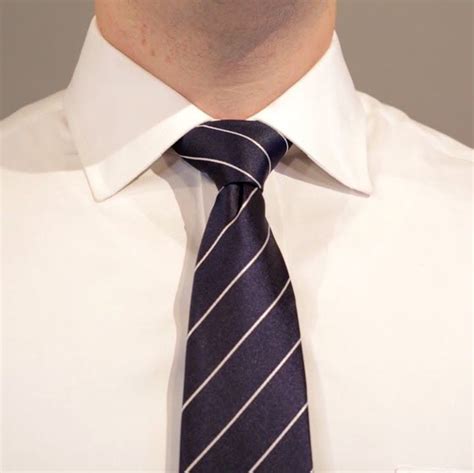It will hold its own against the tie's design and color, and won't fade into the background. How to Tie a Half Windsor Knot - The Modest Man | Half ...