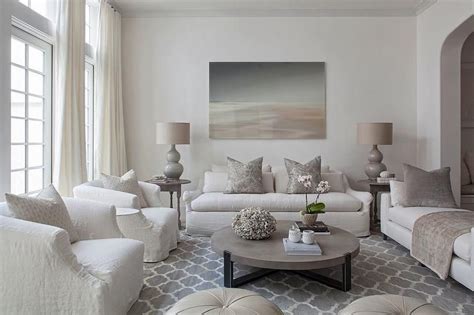 Chic Living Room Boasts A Gray Abstract Art Piece Standing Over An