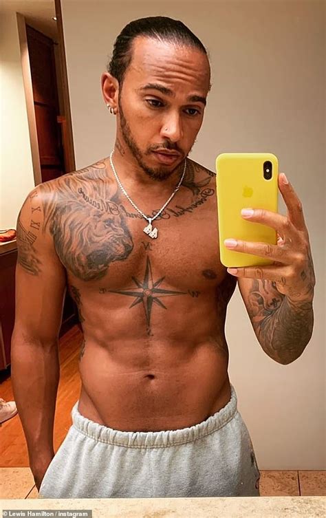 Lewis Hamilton Displays His Ripped Physique As He Goes For An Early