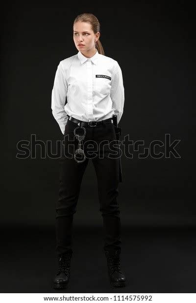 Female Security Guard Uniform On Dark Stock Photo 1114575992 Shutterstock