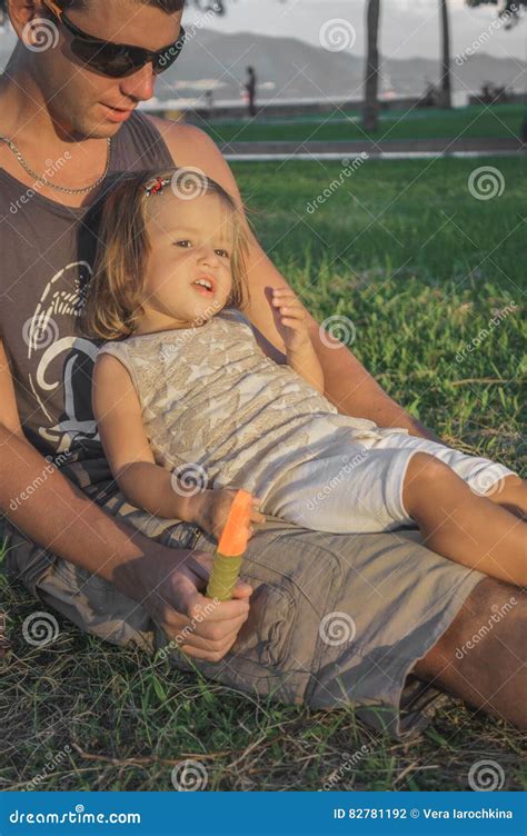 Daughter Sitting On The Lap Of Dads Stock Photo Image Of Bubbles