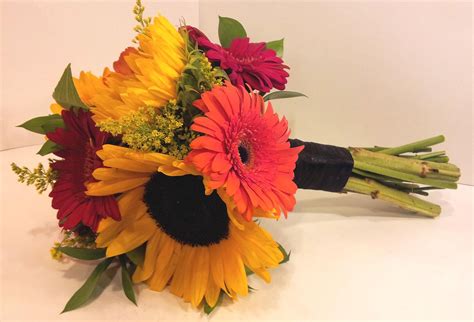 Fall Theme With Sunflowers And Red Yellow Orange Gerbera Daisys