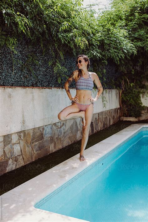 Woman In Bikini In The Pool Del Colaborador De Stocksy Susana