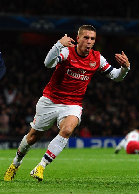 See what the players talk about over a c. Lukas Podolski - Lukas Podolski Photos - Arsenal FC v ...
