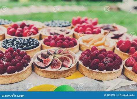 Fruit And Berry Tarts Dessert Tray Assorted Outdoors Stock Image