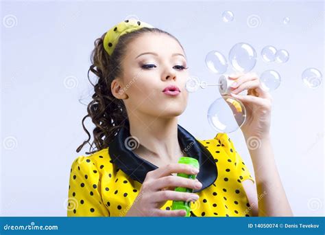 Beautiful Young Woman Blowing Soap Bubbles Stock Photo Image Of