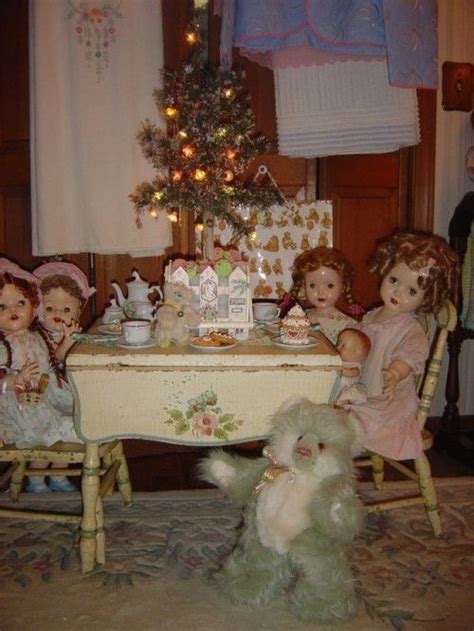There Are Many Dolls Sitting At The Table