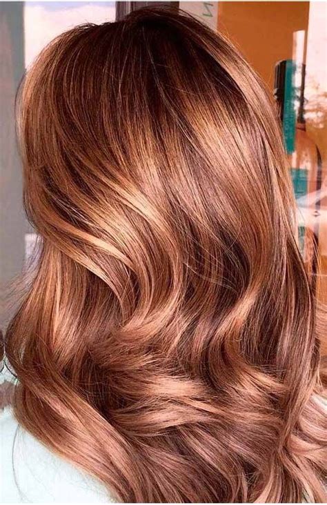 Woman Of 2019 With Medium Length Wavy Copper Hair Hair Color Caramel