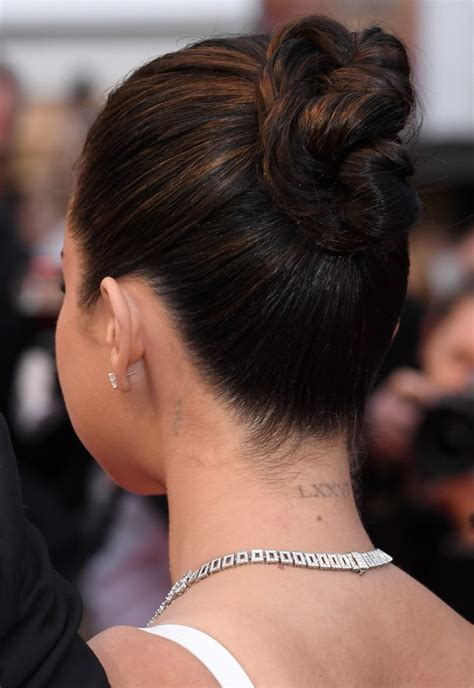 Selena Gomezs 16 Tattoos And Their Meanings A Complete Guide To The