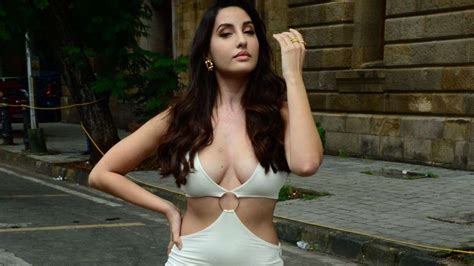 Viral Nora Fatehi Is Hotness Overloaded In Latest Photos Flaunts Her Sexy Curves Cleavage In