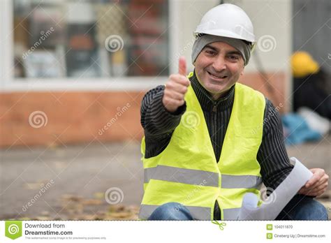 Smiling And Successful Civil Engineer Showing Ok Sign Stock Photo