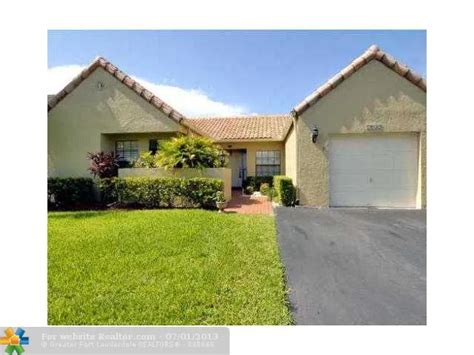 2049 Maplewood Dr Coral Springs Fl 33071 ®